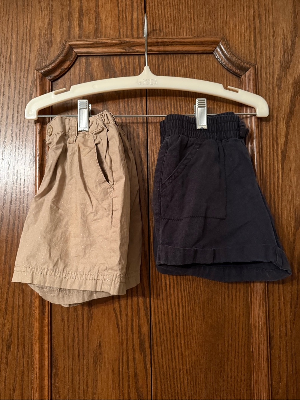Two pairs of neutral coloured girls size 5 shorts. - Picture 1 of 9